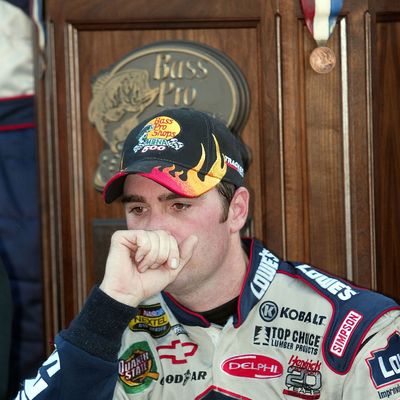 Jimmie Johnson reflects in victory lane after a plane crash killed 10 people in October 2004. 