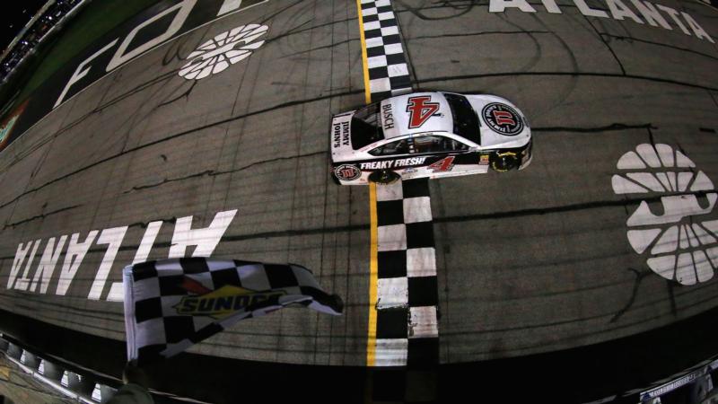 Kevin Harvick, driver of the #4 Jimmy John's Ford, crosses the finish line to win the Monster Energy NASCAR Cup Series Folds of Honor QuikTrip 500 at Atlanta Motor Speedway on February 25, 2018 in Hampton, Georgia.