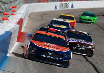 Brad Keselowski, driver of the #2 Autotrader Ford, leads a pack of cars during the Monster Energy NASCAR Cup Series Folds of Honor QuikTrip 500 at Atlanta Motor Speedway on February 24, 2019 in Hampton, Georgia.