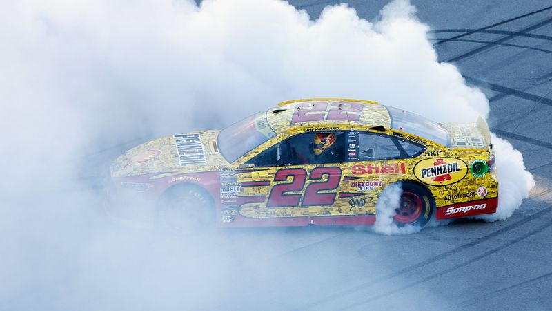 Joey Logano wins at Talladega and moves on to the round of 8.