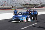 Dale Jr's No. 88 team push his car to the qualifying grid at BMS.