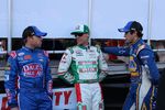 JR Motorsports teammates chat behind the Food City 300 pre-race stage.